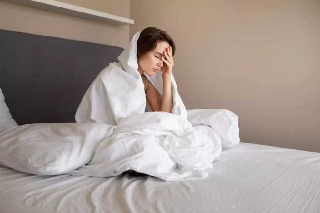 is staying in bed all day a sign of depression